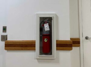 Fire extinguisher in hallway