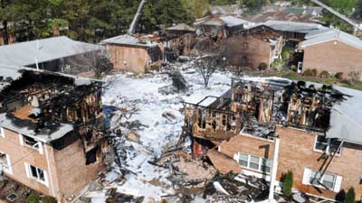 (15) Aerial view of damage to the apartment complex. 