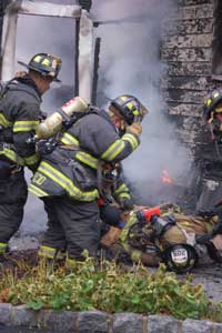 (3) The members operating in the rear of the fire building witness a firefighter down. A 