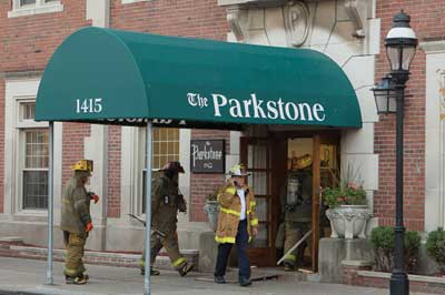 (2) The first-arriving engine company entered the main entrance to determine the location of the fire apartment from the interior as well as the layout of this large multiple dwelling.