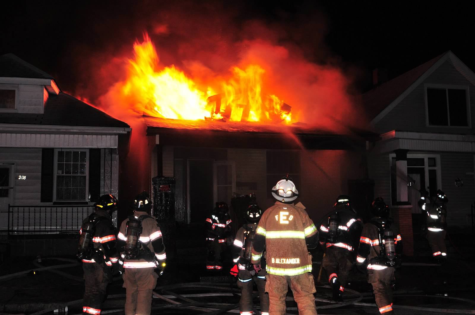 IN Firefighters Contain House Fire. Photo by John Buckman