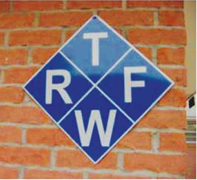 (6) The Blue Diamond Hazard Identification System placard. In this instance, it indicates the presence of truss components in the building's roof and floors. (Photo by author.)