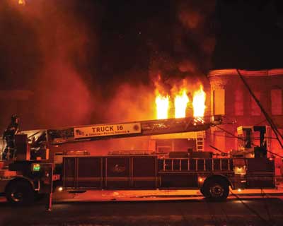 (9) The aerial ladder is the quickest and safest way to get to the roof position. (Photo by Nick Eid.)