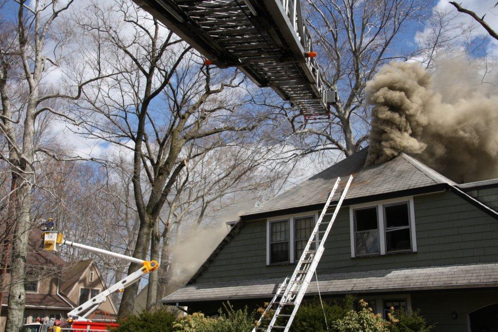 NJ Firefighters Battle Basement Fire with Extension