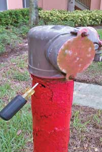 (5-6) These FDCs have failed, necessitating supplying the standpipe system from a first-floor outlet or, in the case of PRVs, the fire pump test header. In photo 5, salt air has corroded the pipe below the FDC to a point that it can be penetrated with a screwdriver. In photo 6, this FDC was 