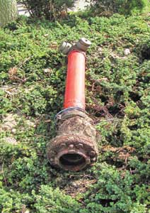 (5-6) These FDCs have failed, necessitating supplying the standpipe system from a first-floor outlet or, in the case of PRVs, the fire pump test header. In photo 5, salt air has corroded the pipe below the FDC to a point that it can be penetrated with a screwdriver. In photo 6, this FDC was 