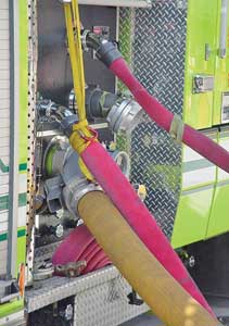 (7-8) To prevent injury if a hoseline bursts during high-pressure pumping, connect hoselines to discharges on the right side of the apparatus, not at the pump panel. As an added precaution, lash hoselines to the apparatus and FDC with nylon webbing.