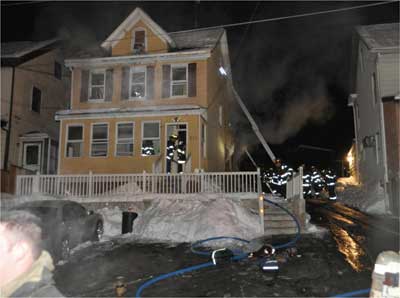 (1) In this private dwelling, firefighters discovered an apartment on the first floor, three single-room occupancies on the second floor, and an apartment in the attic. (Photo by Tom Bierds.)