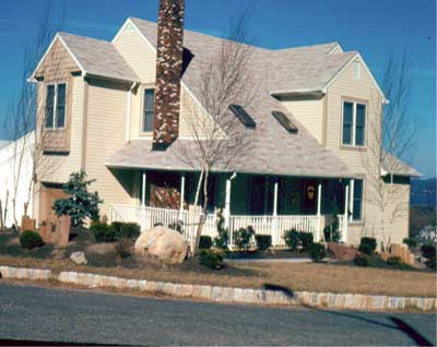 (2) Although designed to resemble an old farmhouse, this modern house incorporates many modern features and construction materials. Because of changes in occupancy, furnishings, and construction methods/materials, contemporary homes may contain many life-threatening firefighter hazards. Don't underestimate them. (Photos by author unless otherwise noted.)