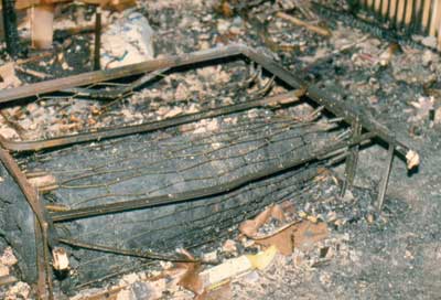 (3) This rollaway bed, found in a hallway, could become an entanglement hazard and, hence, a deathtrap for firefighters in a rapidly developing fire. Firefighters have been killed after they have been caught in bicycles, rollaway beds, and other hazards.