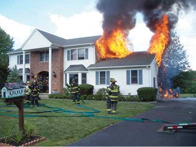 (6) The vinyl siding that was autoexposed by the original fire ignited spectacularly but miraculously did not enter the gable vent or attic.