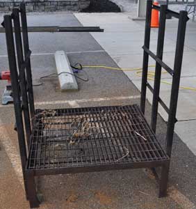 (6) Construction of the elevated burn hearth used in the CCF's Class A burn building. [Photo courtesy of Chesterfield (VA) Fire & EMS, Training & Education Unit.]