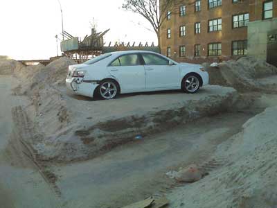 (1-2) The force of the storm tossed cars about as if they were toys. (Photos by author.)