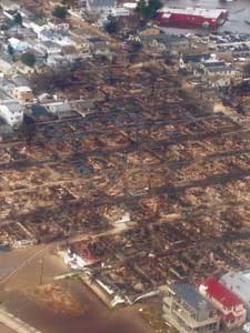 (3) A view of the Breezy Point, Rockaway, Queens conflagration from a Task Force Guardian copter during a US&R aerial recon. (Photo courtesy of the Federal Emergency Management Agency.) 