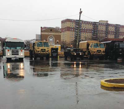 (1) National Guard trucks at the Rockaway command post. (Photos by author.)