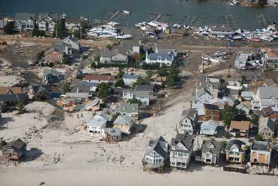 (1) A typical view of Route 35, the main north/south road for the barrier island. With debris covering this road, many municipalities became confined to their local geographical area. (Photos by author unless otherwise noted.)