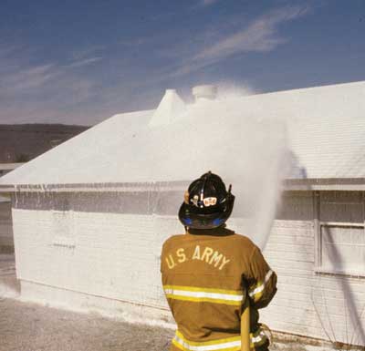 (1) When CAF is applied on a vertical surface, it can adhere to it for an extended time. (Photo by D. Madrzykowski.)