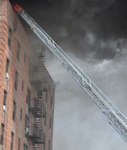 (1) Firefighters operating on fire escapes often ventilate windows by starting with the 