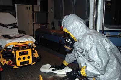 (4) Thoroughly clean the ambulance and equipment. Discard grossly contaminated objects.