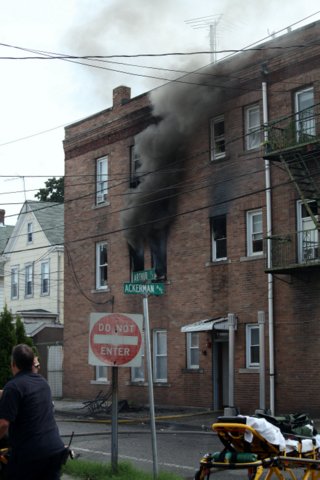 NJ Firefighters Extinguish Apartment Fire. Photo by Tony Greco.