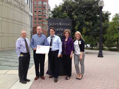 (2) (L to R): Dr. Stuart Grossman, cancer researcher at Johns Hopkins; Newland, RPFFCF president; Dr. Matthias Holdhoff, cancer researcher at Johns Hopkins; Tricia Newland, RPFFCF secretary; and Megan LeDonne, assistant director of development at Johns Hopkins. 