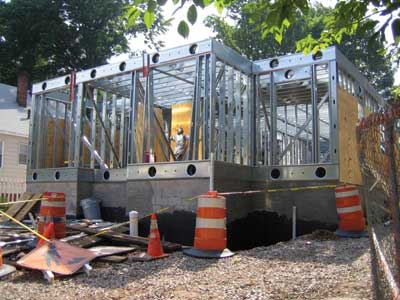 Peel away the outside shell, however, and it reveals a Type II noncombustible constructed of lightweight cold-formed steel wall studs, floor joists, and (not shown here) lightweight metal roof rafters. 