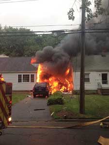 (1) The first-due engine company arrived to find 64 and 68 Charter Oak Avenue involved.