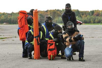 Law enforcement tactical escort of EMS into a warm zone.