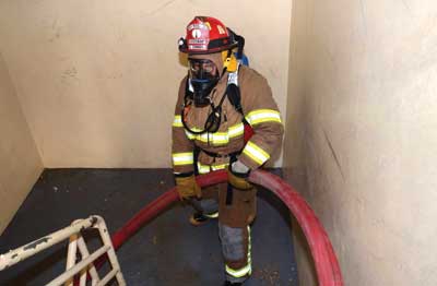 mule at half-landing below the fire feeds hose to the mule at the fire floor landing, who feeds it to the nozzle team.