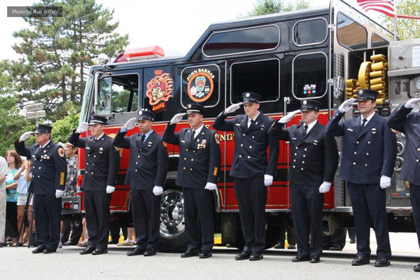 Firefighters at the funeral for firefighter John Barnas.