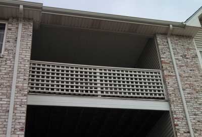 third-floor balcony with vinyl siding, vinyl ceiling, and a perforated vinyl soffit