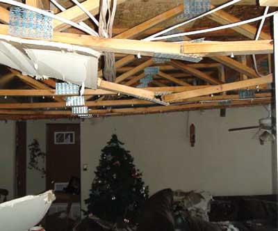 weight of the water broke this second-floor ceiling flat truss