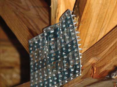 weight of the water broke this second-floor ceiling flat truss