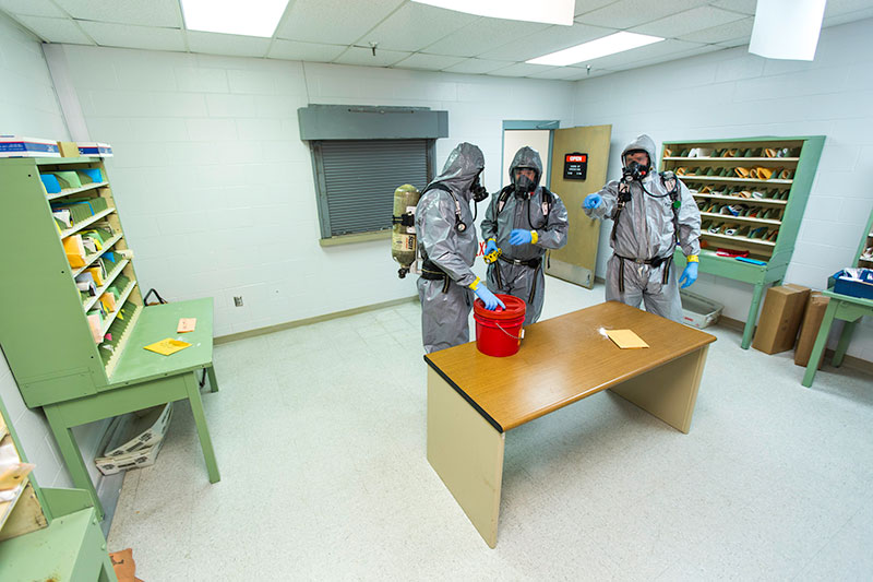 Emergency responders survey the scene of a suspected biological threat at the Center for Domestic Preparedness (CDP). 