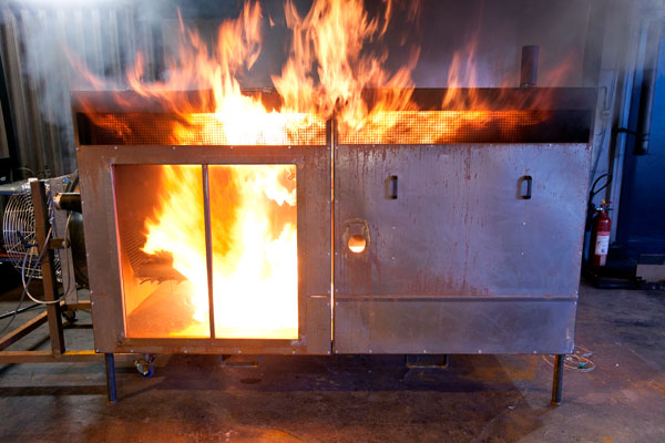 Fire testing in a test rig, simulating a bus engine compartment, at SP in accordance with SP method 4912.