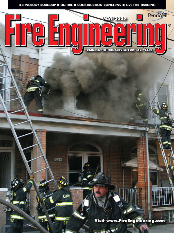 This photo of a fire in Camden, New Jersey, is a near-perfect example of well-coordinated fireground operations, as members perform several essential tasks simultaneously.