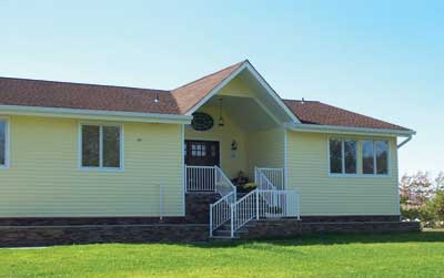 The same house with the lifting completed later in the year