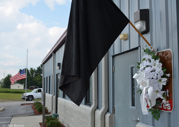 The American flag at half mast at the station.