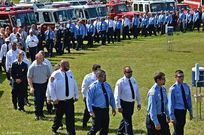 A long line of firefighters and officials attending the service for fallen Justice (NC) Firefighter Derek Gupton.