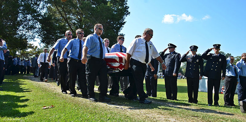 The casket of fallen Justice (NC) Firefighter Derek Gupton.