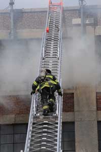 (1) A member makes his way to the roof between the cell phone antennas. Because of the possibility of exposure, limit the time in front of the cell antenna