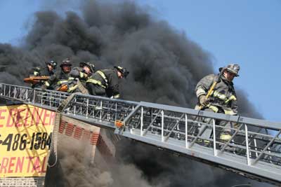 (6) Members are abandoning the roof because of the amount of fire that has taken hold of the roof. 