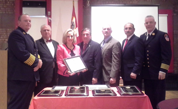 Photo 3, from left to right: James Weck, Nyack Fire Chief; Jefferson Crowther & Allison Crowther, parents of Nyack FF Wells Crowther; Jack J. Murphy, FSDA Chairman; Russell Touhey, FSDA President, Nick Gaudiosi, FSDA Past President and 9/11 Committee Chair; and John Sudnik, FDNY Assistant Chief, Manhattan Borough Command.