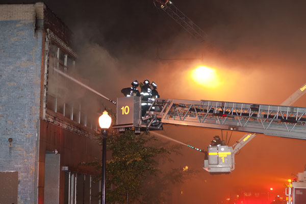 Aerials operating at a fire scene.