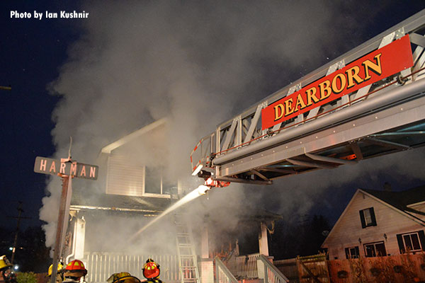 Flowing water from a Dearborn apparatus in the burning home.