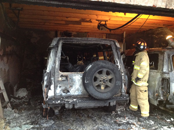 Another of the vehicles that burned in the garage.