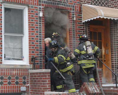 (3) A civilian is being removed through the front door, and the door is open. This flow path will allow additional oxygen to feed the fire.