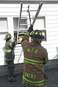 (6) Place the roof ladder into the window with the tip first to perform the maneuver. If it's difficult to reach the rung, use a hook to pull it down. Remember that the farthest rung back offers the most leverage or mechanical advantage.