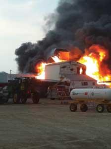 (3) The first-arriving West Volunteer Fire Department crew, Engine 1, set up operations on the east side of the plant.