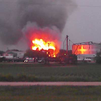 (4) This photo was taken from the high school, approximately 1,600 feet southeast of the plant, believed to be just prior to the explosion.